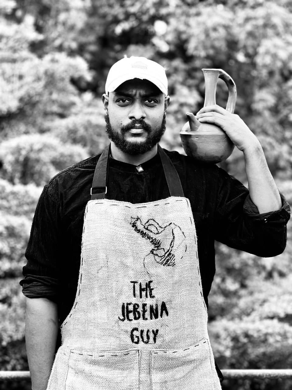 Tajur Tamirayehu holding a jebena